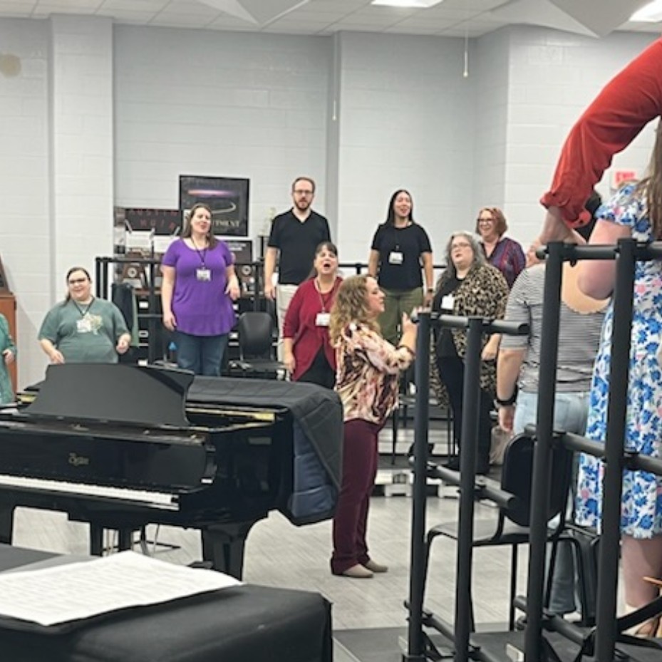 Deb Barrick leads Morning Sing