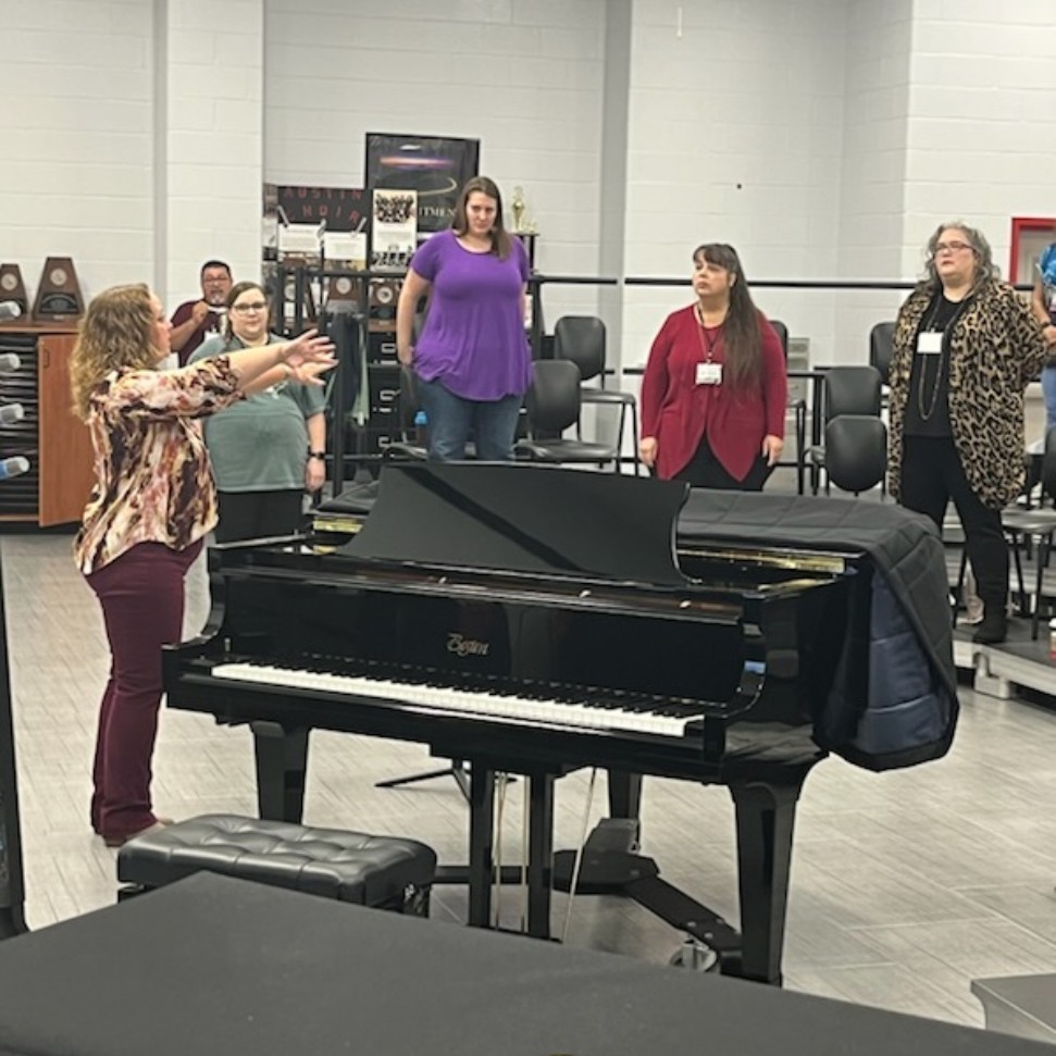 Deb Barrick leads Morning Sing