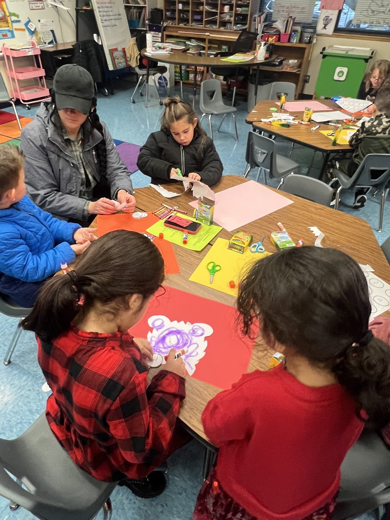 Students coloring and retelling the story.