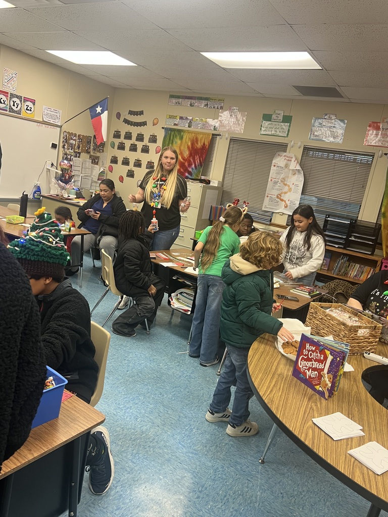 4th grade making gingerbread houses.