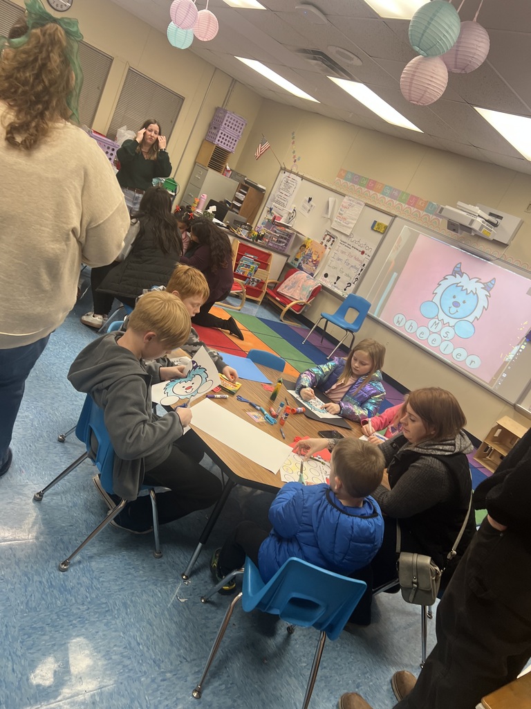 Students working hard on literacy stations.