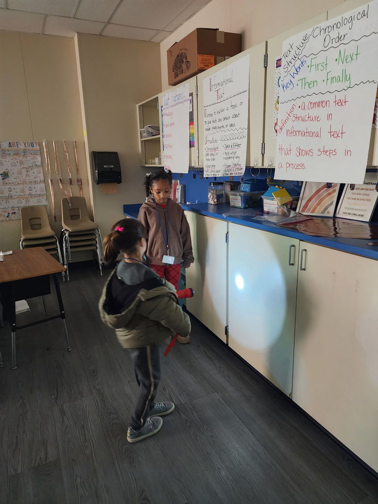 students with flashlights