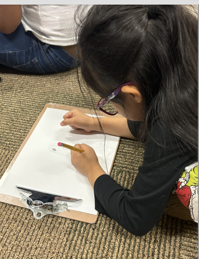 Students drawing pictures