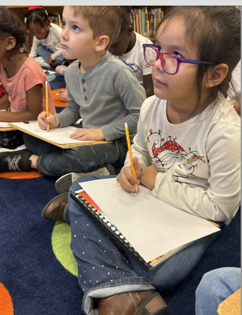 Students drawing pictures