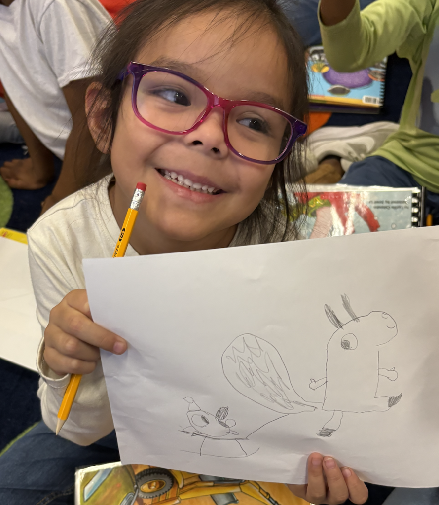 Student with drawing