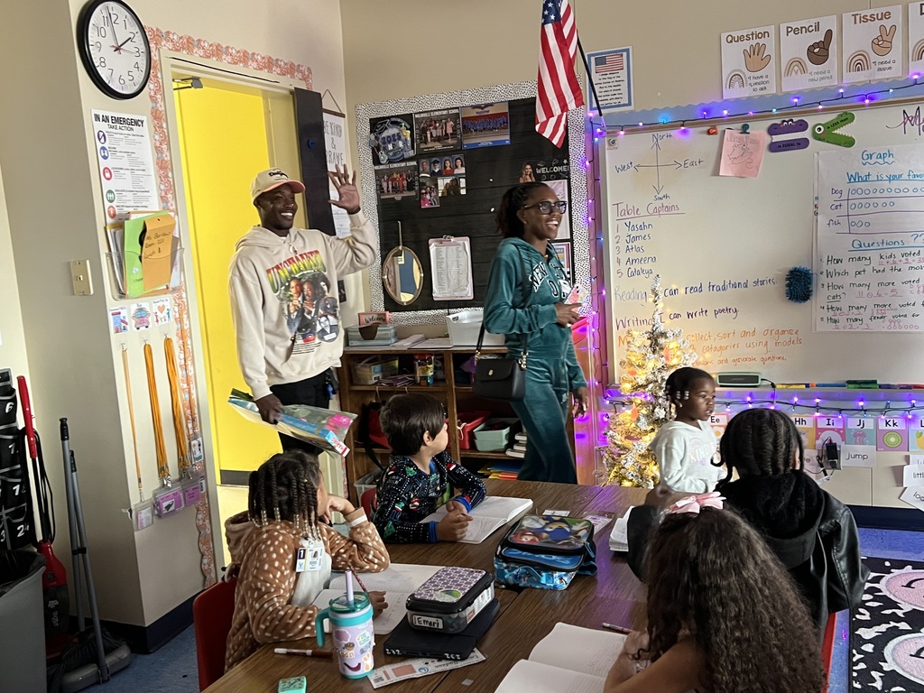 Dad walks into the classroom.