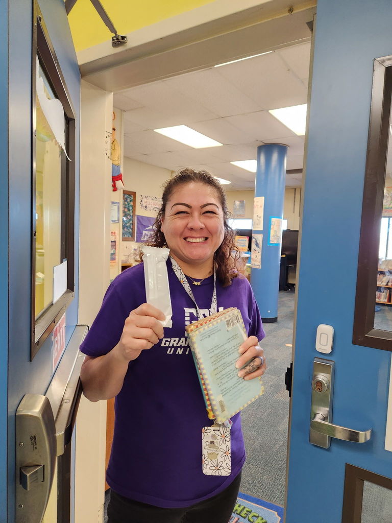 Teacher enjoying icecream bar.