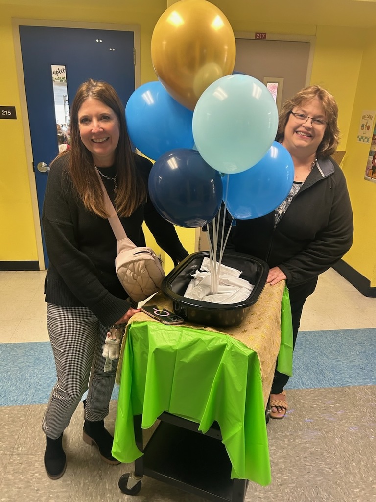 Staff pushing the cart.