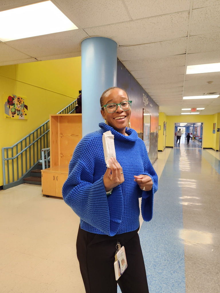 Teacher enjoying icecream bar.