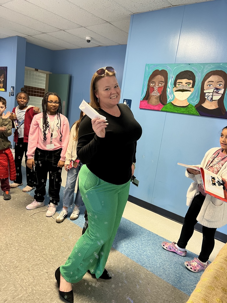 Teacher enjoying icecream bar.