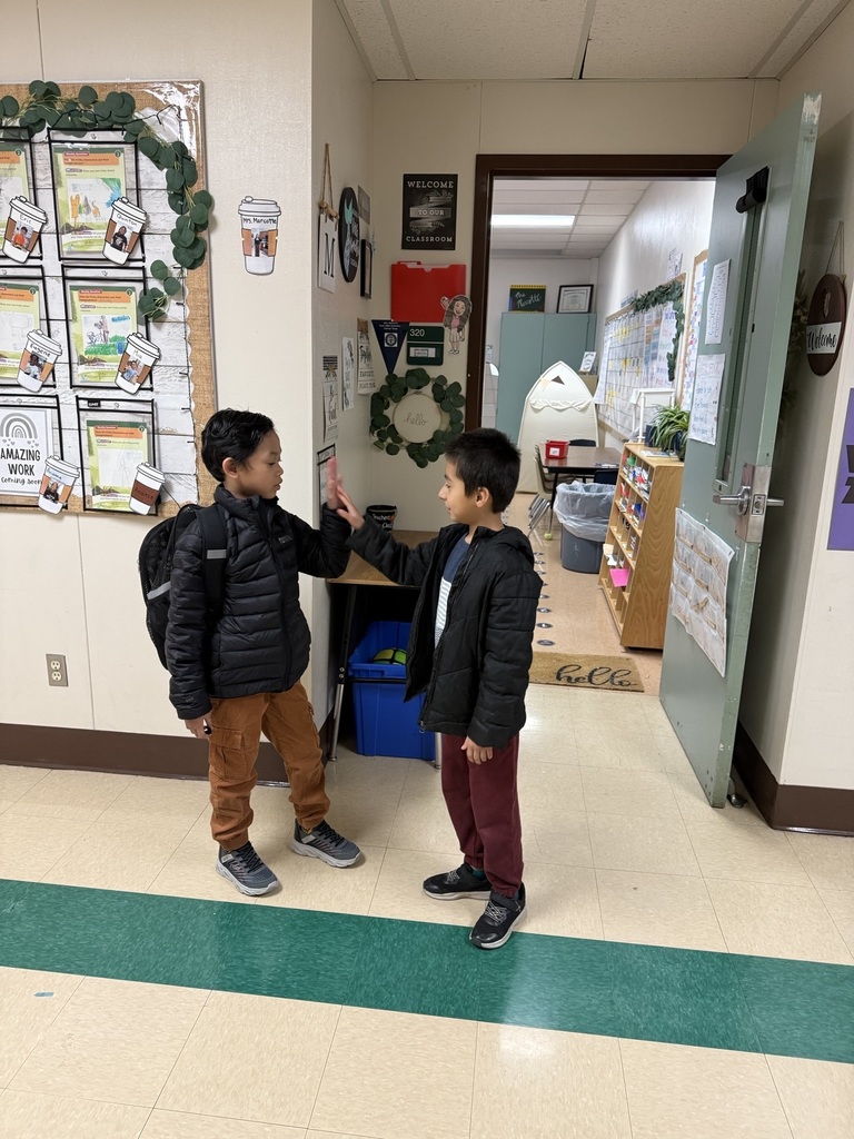 student greeting others