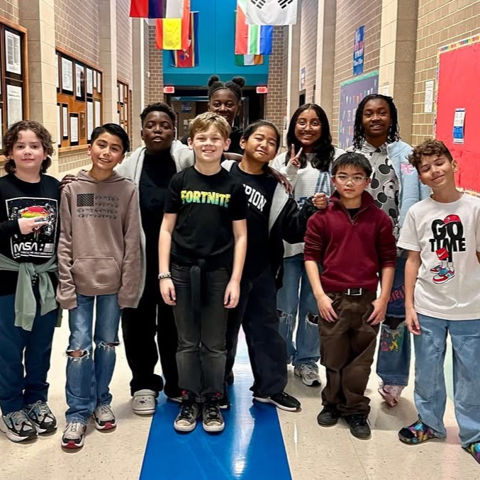 students standing in hall 