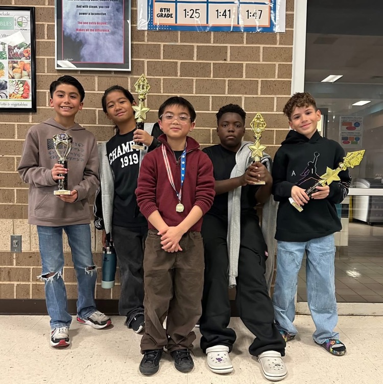 students holding trophy’s 