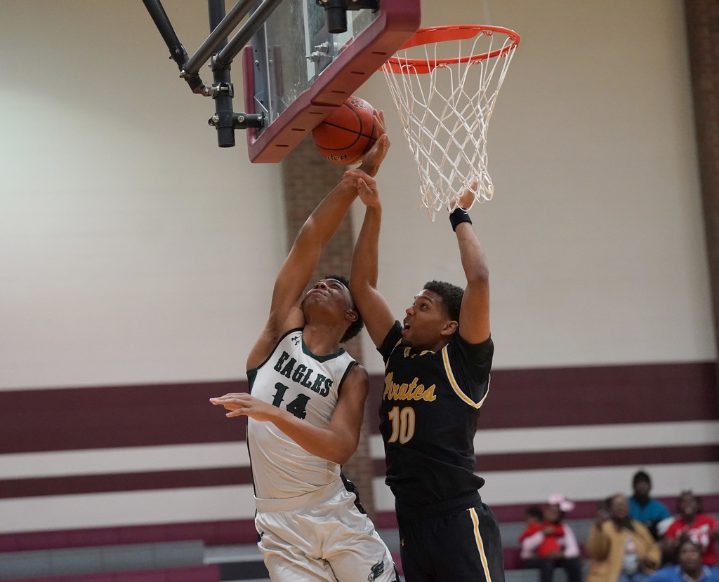 Ellison basketball player at the net