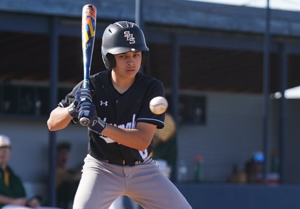SHS batter watches the ball