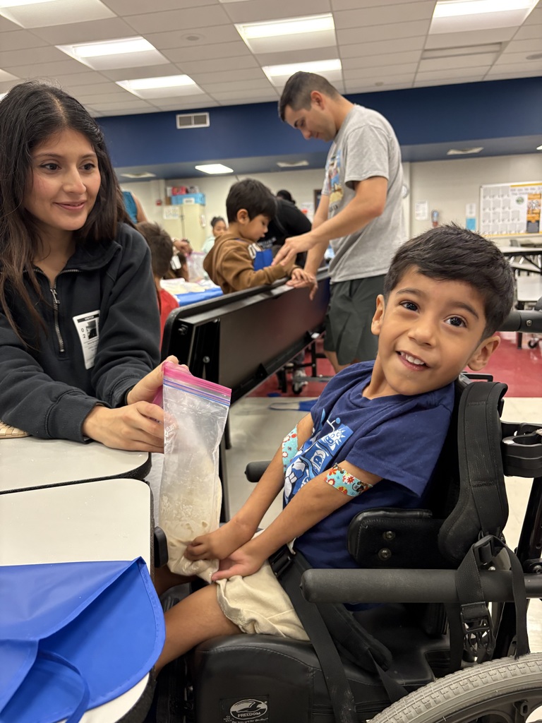 students and families making bread in a bag