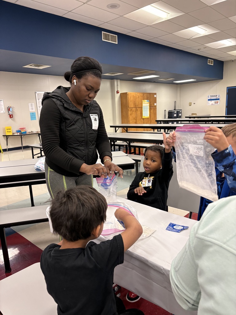 students and families making bread in a bag