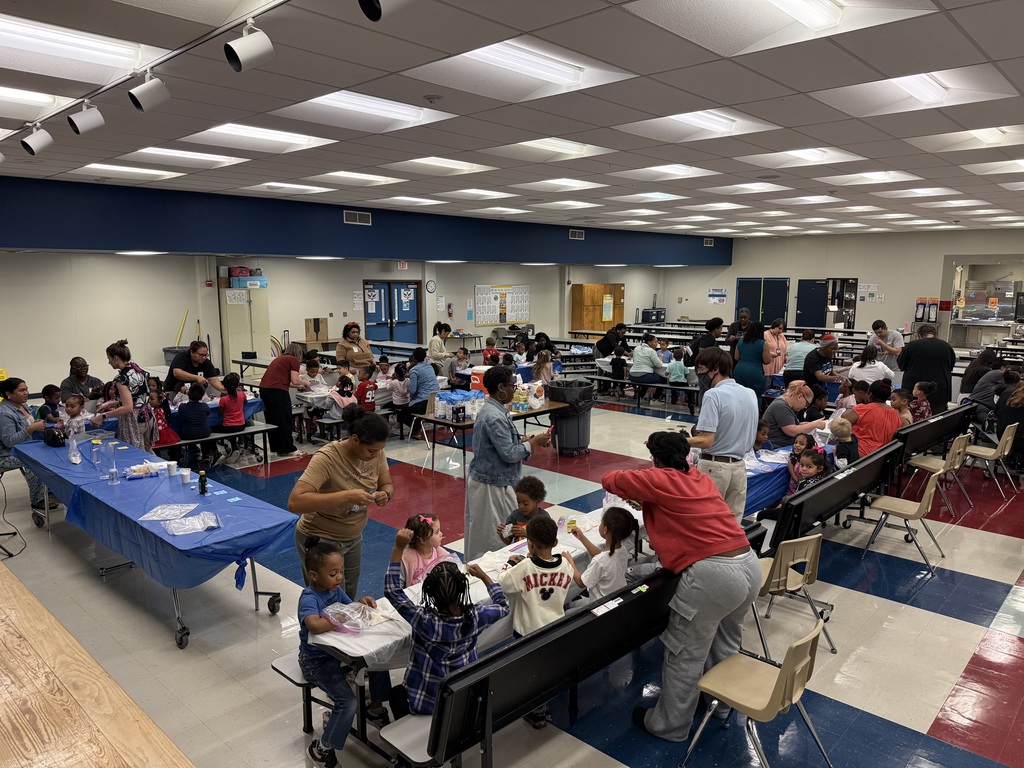 students and families making bread in a bag