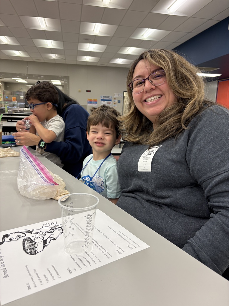 students and families making bread in a bag