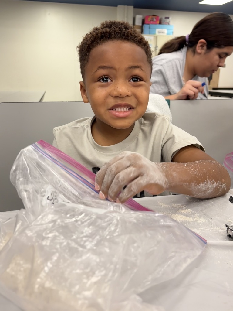 students and families making bread in a bag