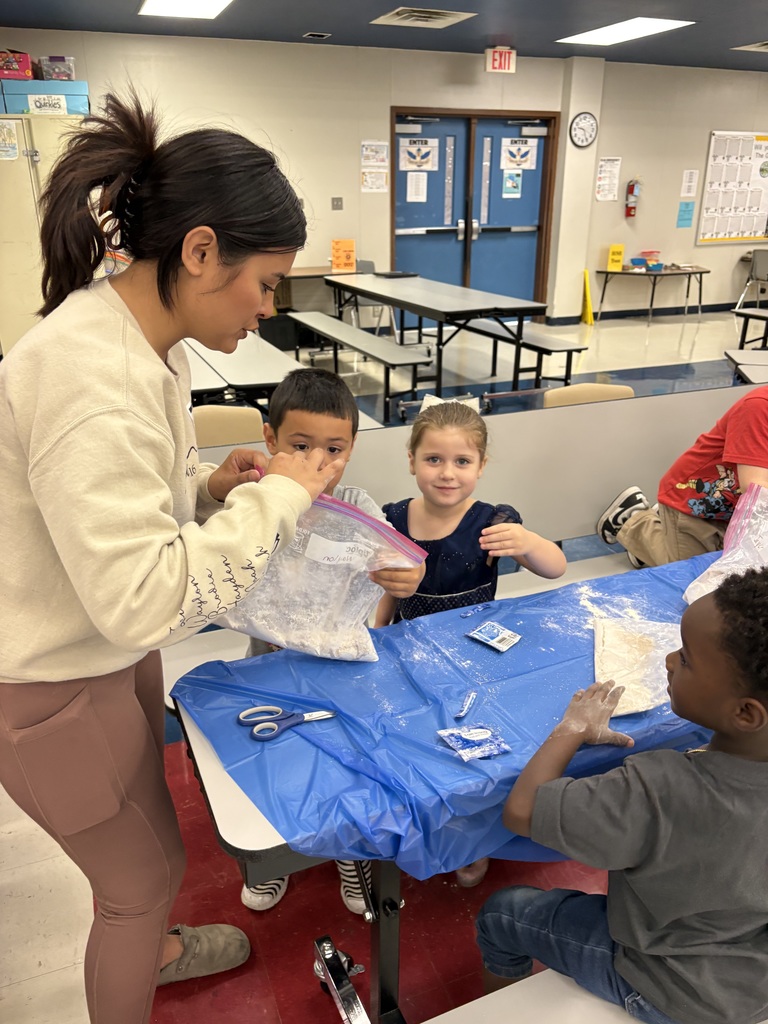 students and families making bread in a bag