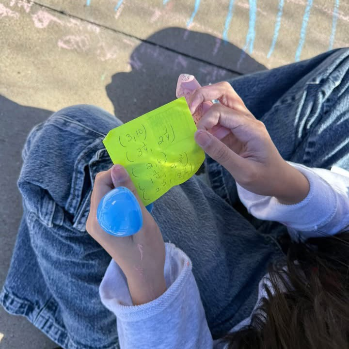 student holding paper