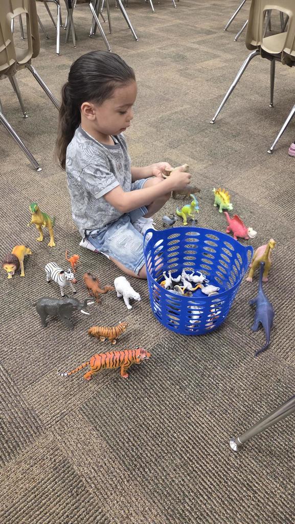 kids playing with dinosaurs