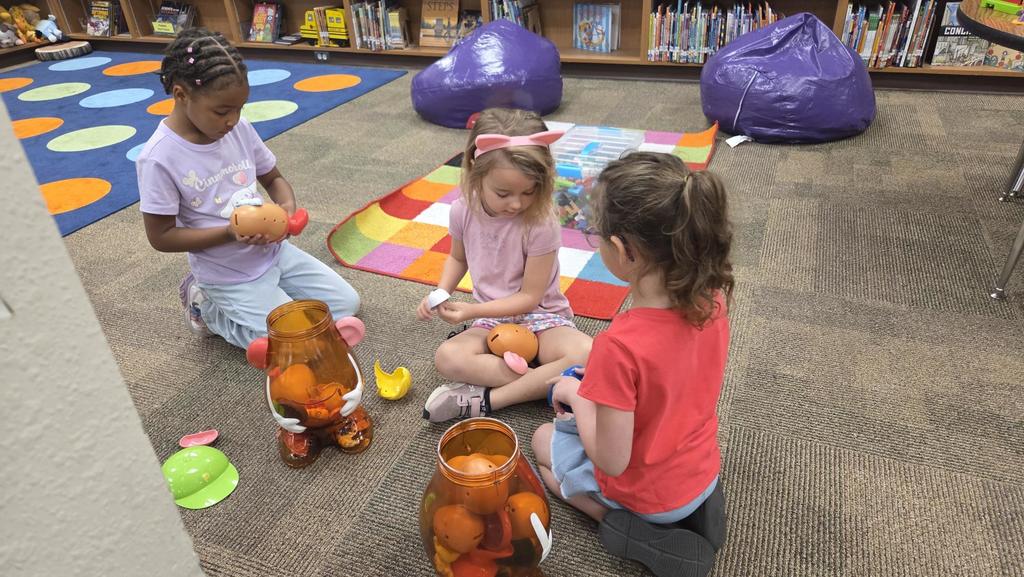 kids playing in the library