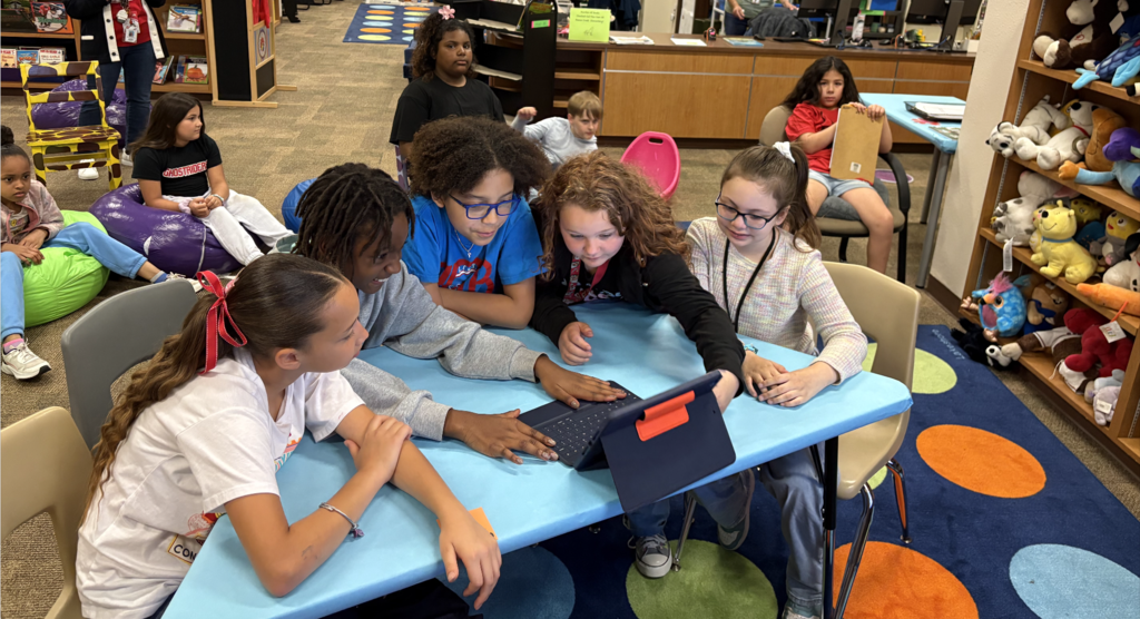 Students working on the ipad