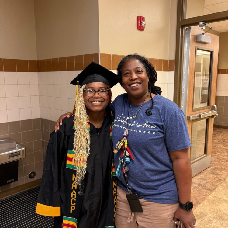 student in cap and gown with Mrs Washington