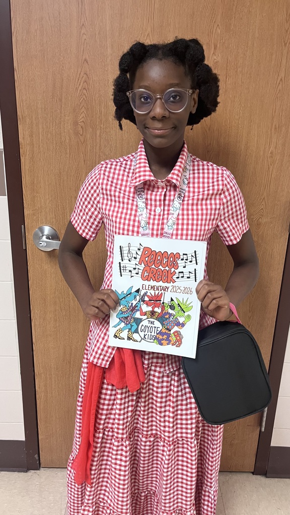 Student holding yearbook