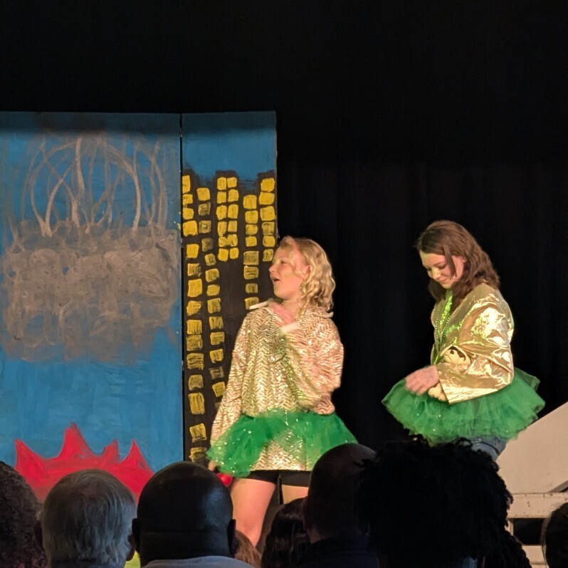 Two girls in sequin jackets