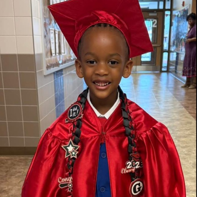 graduate in cap and gown
