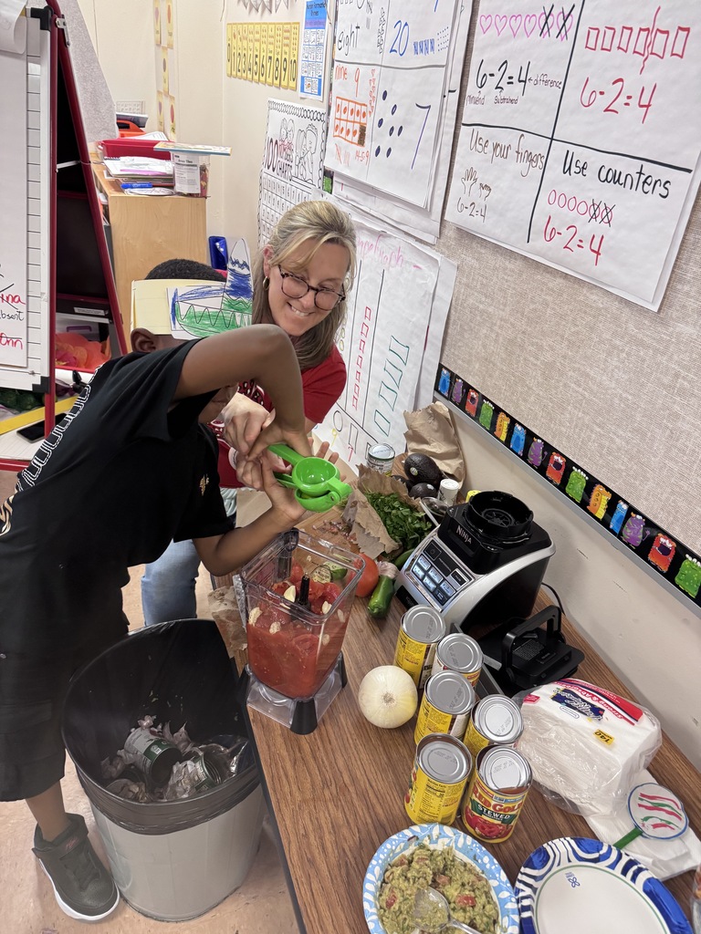 student and adult making salsa