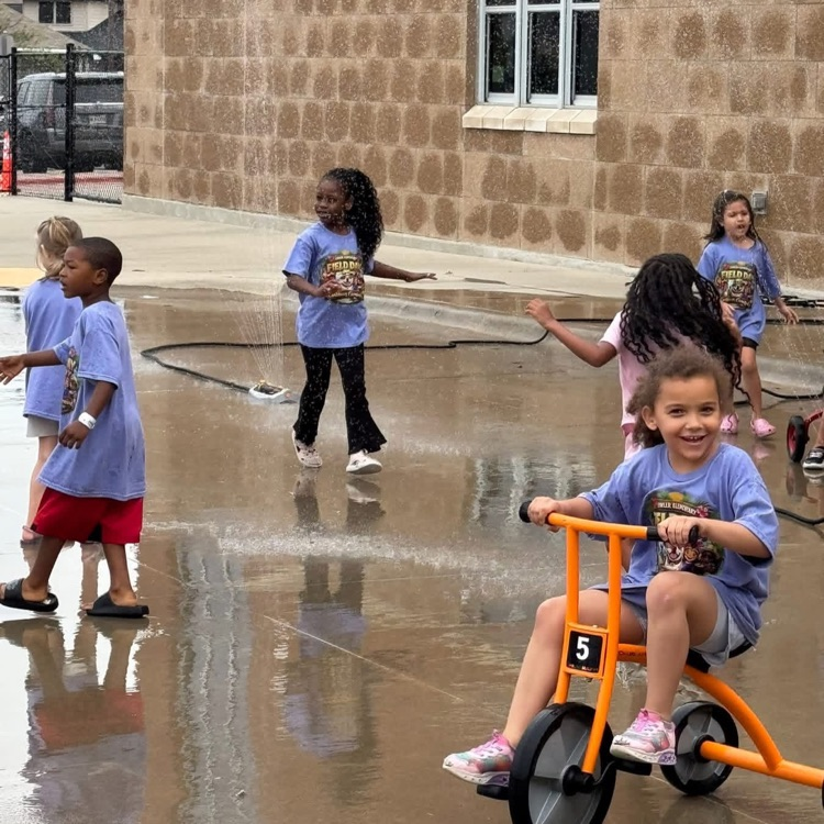 student on tricycle