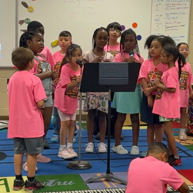 students singing karaoke