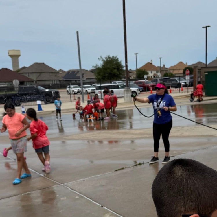 teacher with hose 