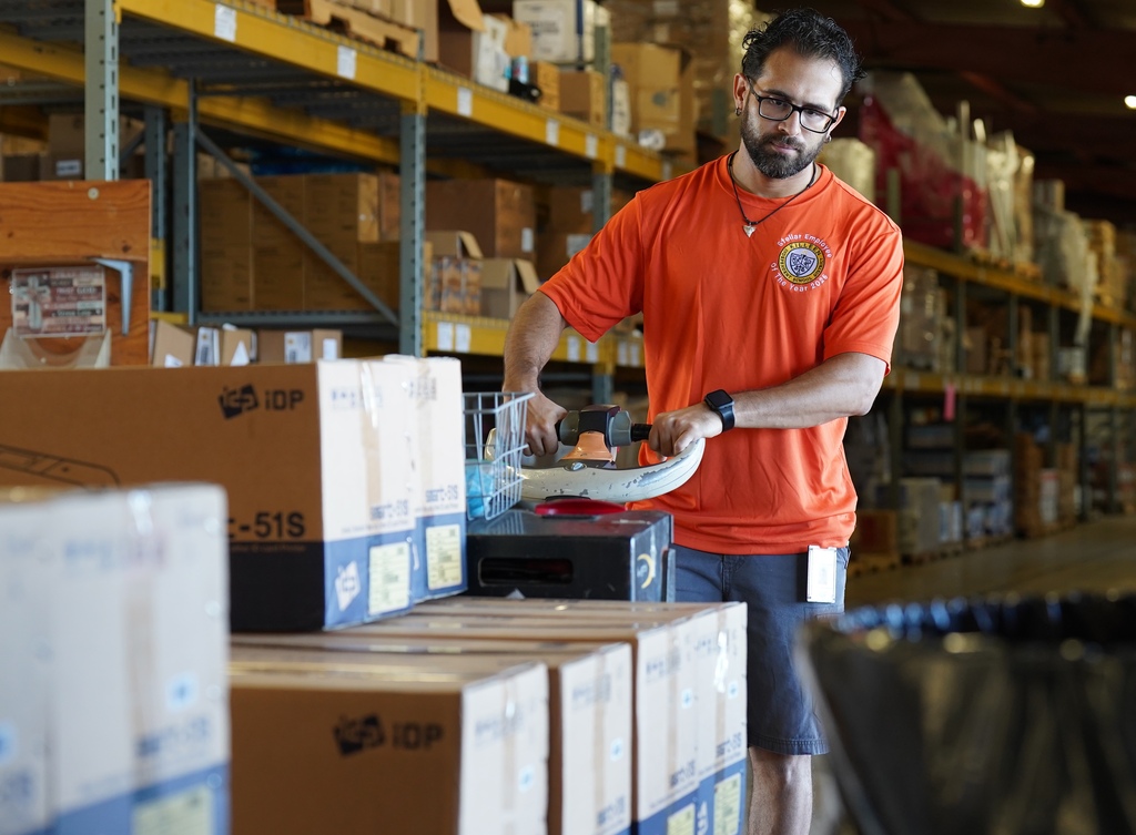 KISD employee moves boxes