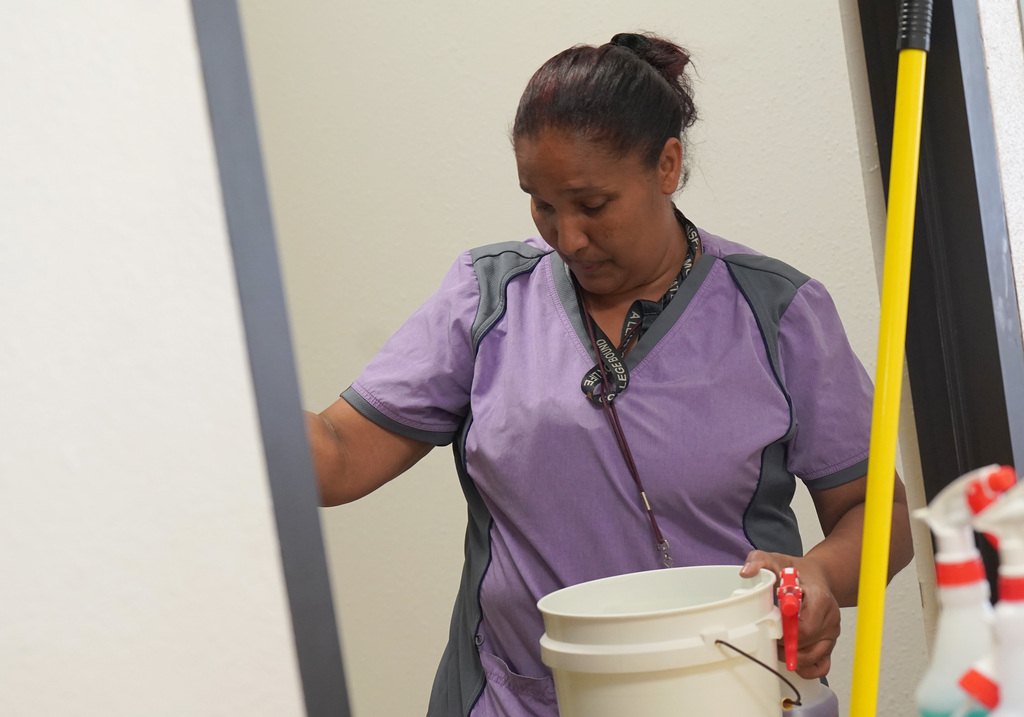 KISD employee cleans