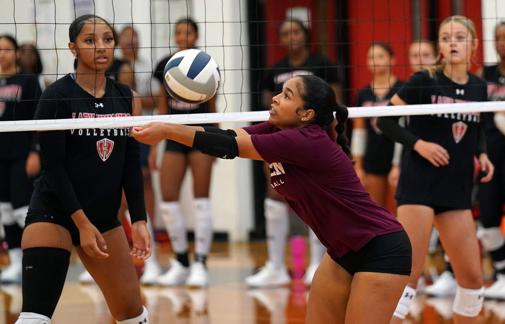 KHS volleyball players bumps the ball