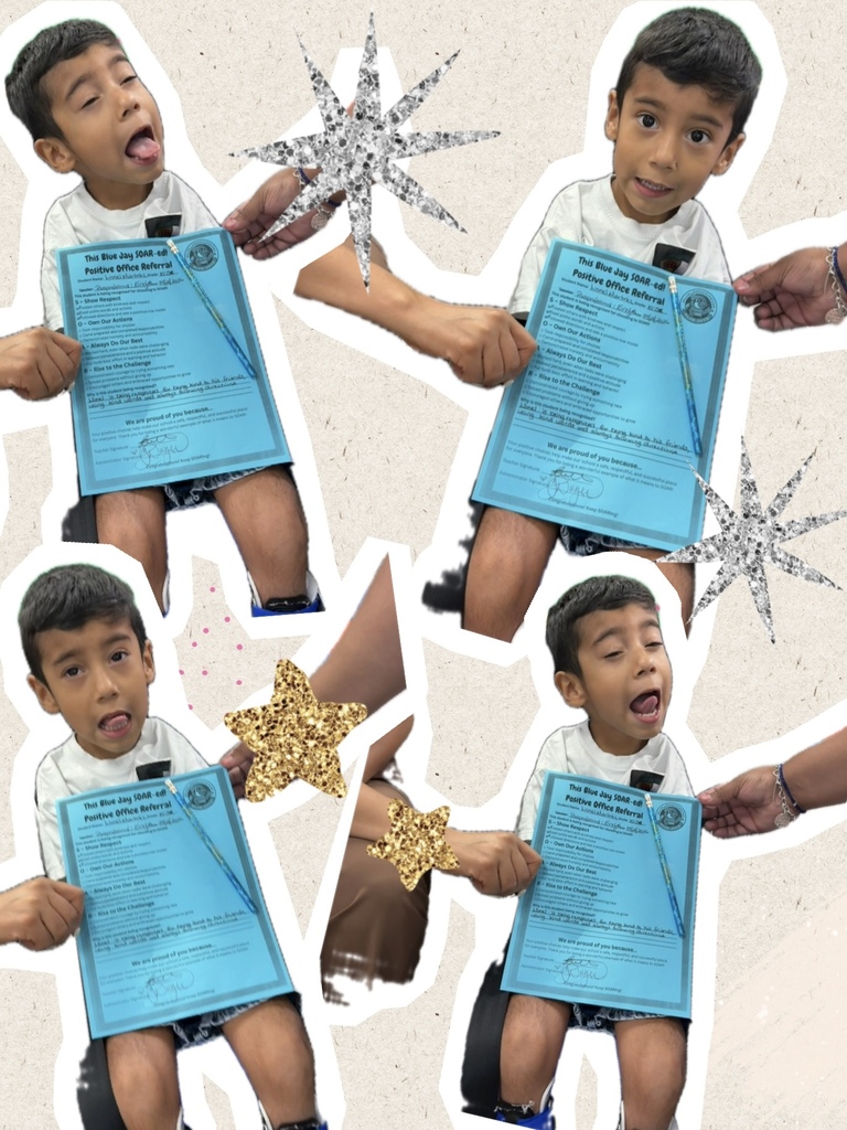 student holding blue paper