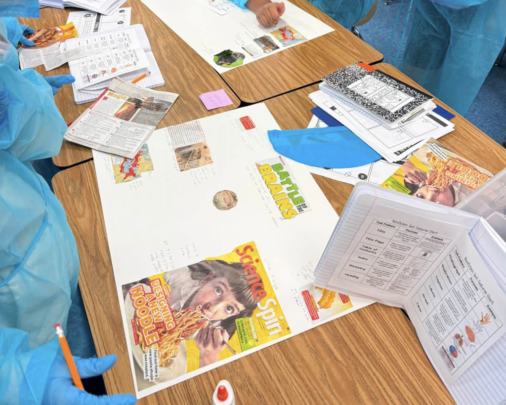 pasteboard with cut out and journal entries