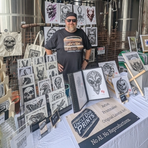 Mr. McNiesh displaying his prints.