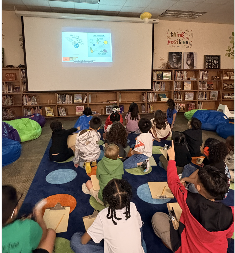 students watching a screen