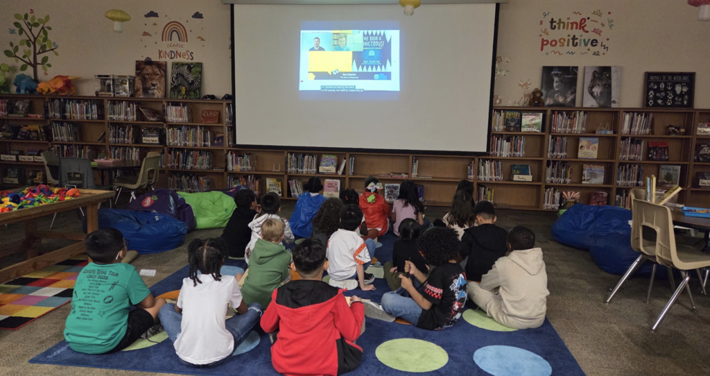 students watching a screen
