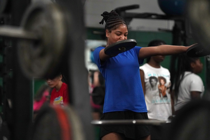 EHS athlete lifts weights