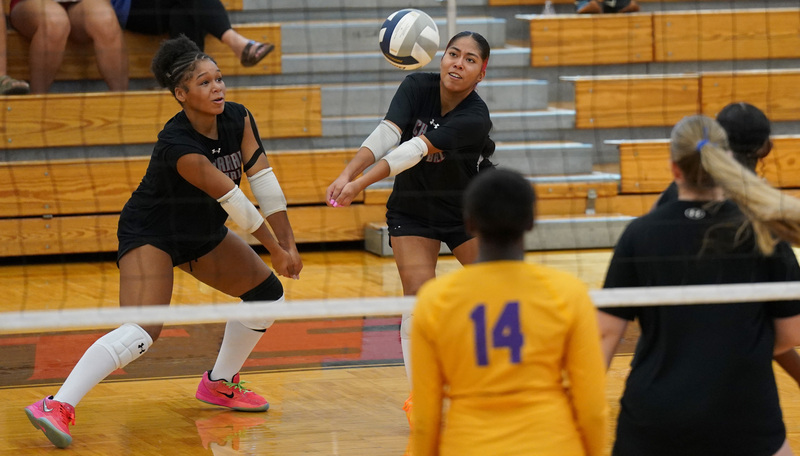 Volleyball player bumps the ball