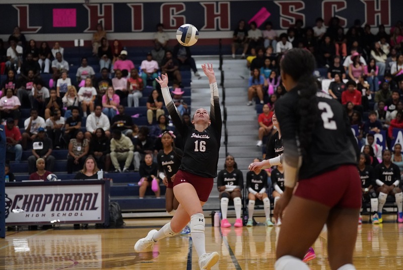 CHS volleyball players sets the ball