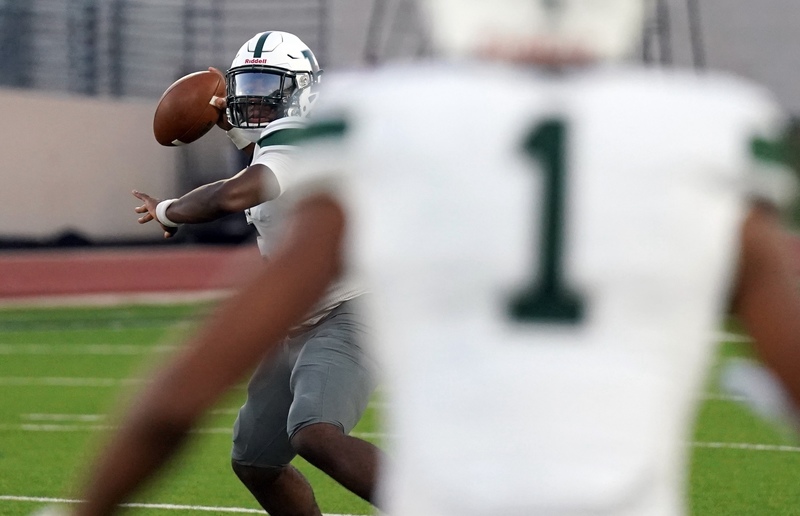 EHS quarterback throws