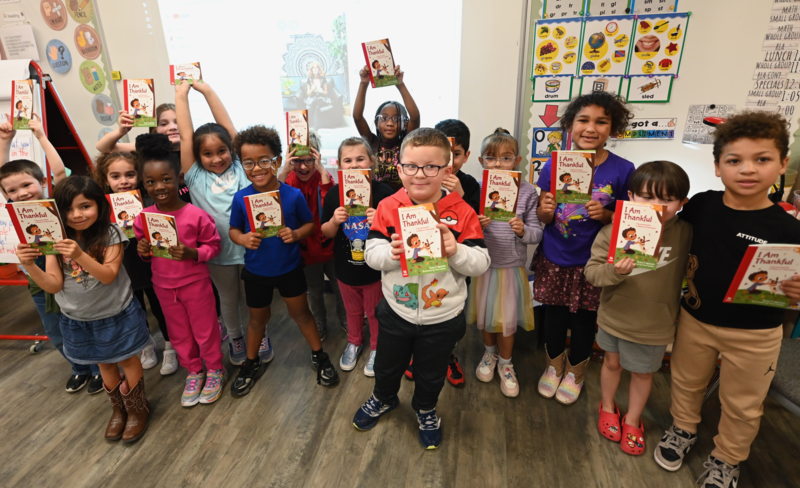 Book donation to Clarke ES